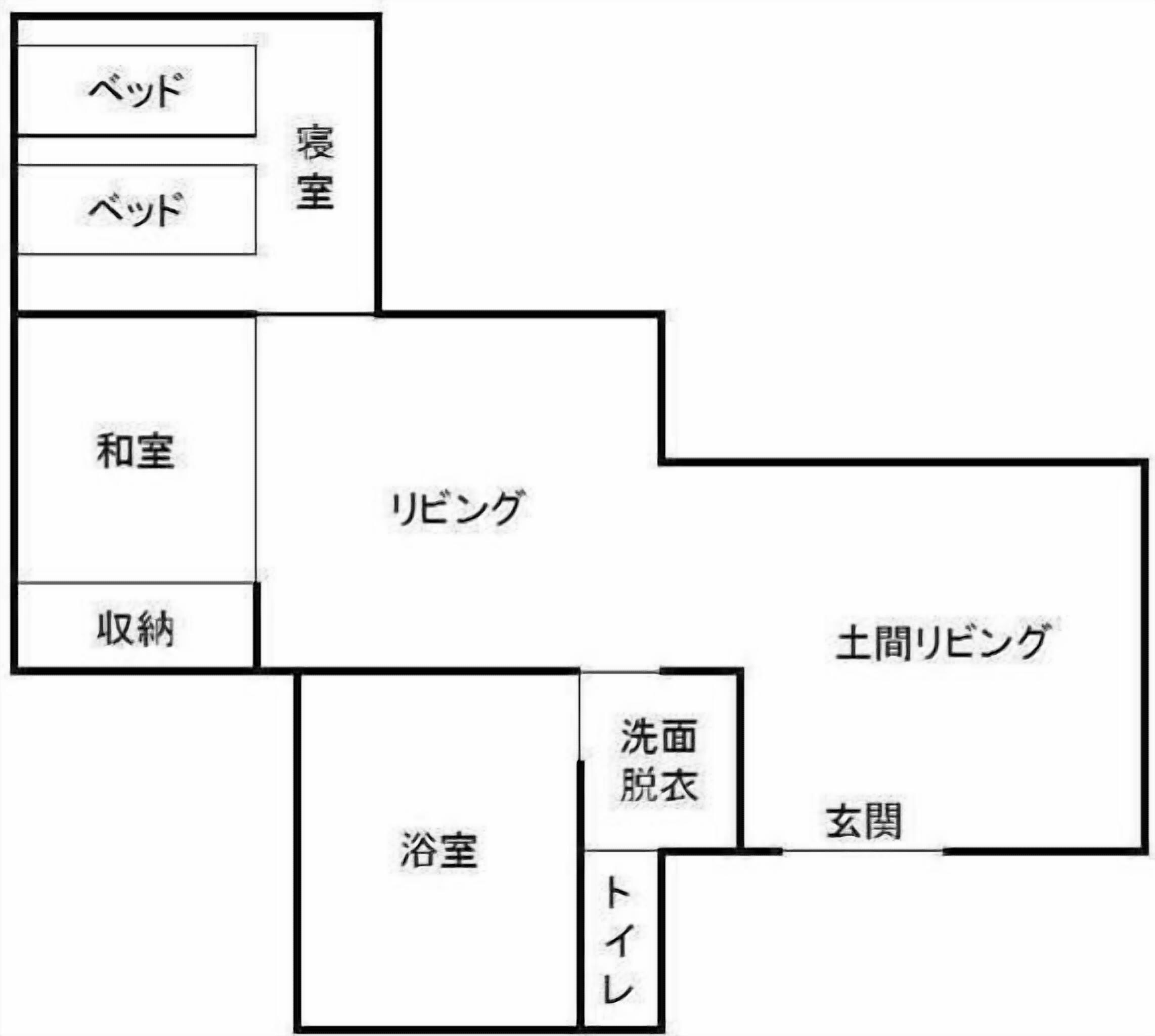 A hotel floor plan with a living room, bedroom, bathroom, and laundry area.