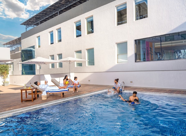 Outdoor pool, open 10:00 AM to 4:00 PM, sun loungers