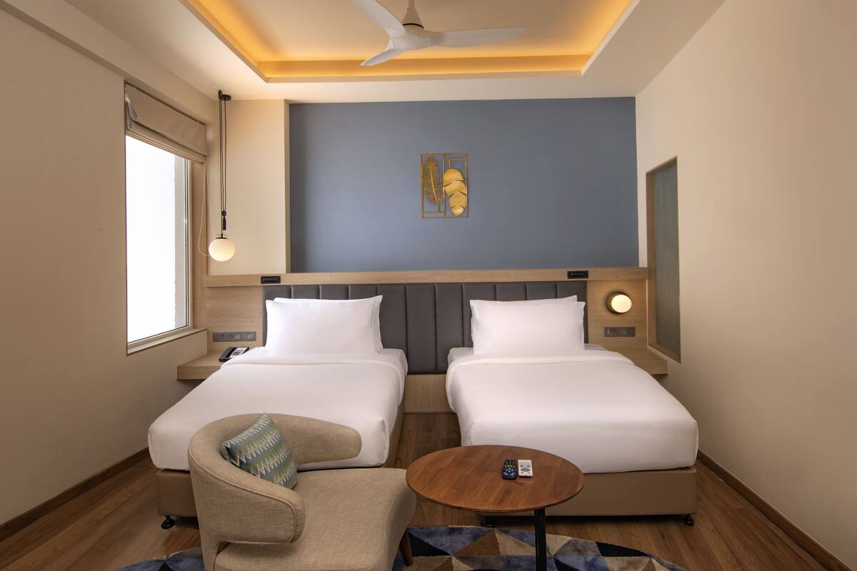 deluxe twin | 1 bedroom, premium bedding, in-room safe, desk