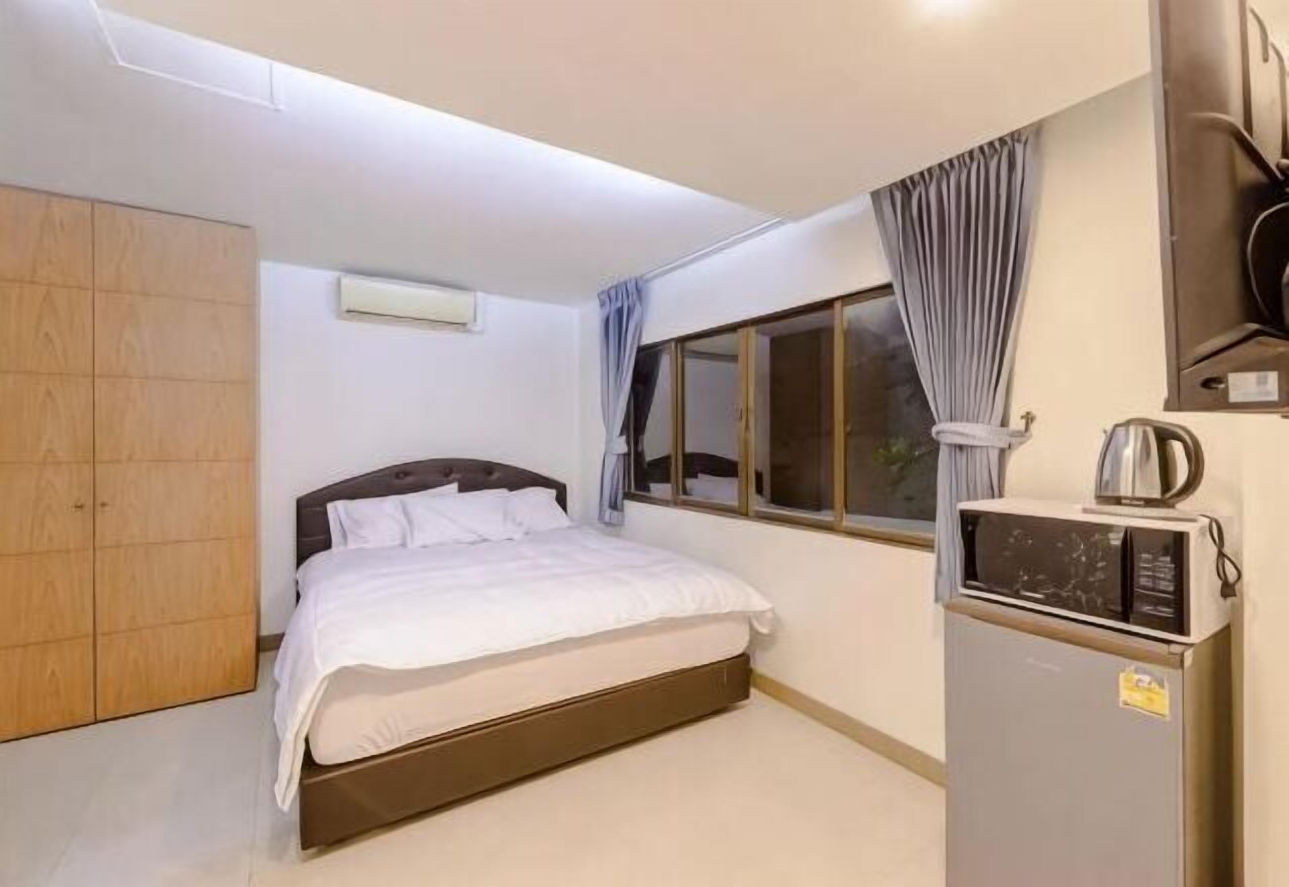 Premium bedding, down duvets, Select Comfort beds, minibar
