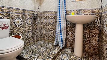 Hair dryer, slippers, towels