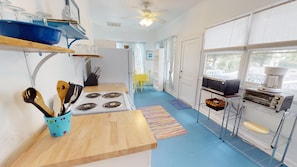 Fridge, microwave, stovetop, coffee/tea maker