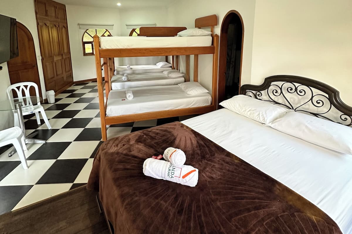 Family Room, Multiple Beds | Individually decorated, individually furnished, free WiFi, bed sheets