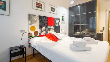 1 bedroom, premium bedding, down comforters, individually decorated