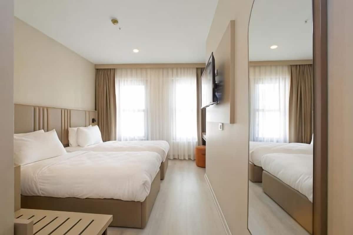 Hochwertige Bettwaren, Daunenbettdecken, Minibar, schallisolierte Zimmer