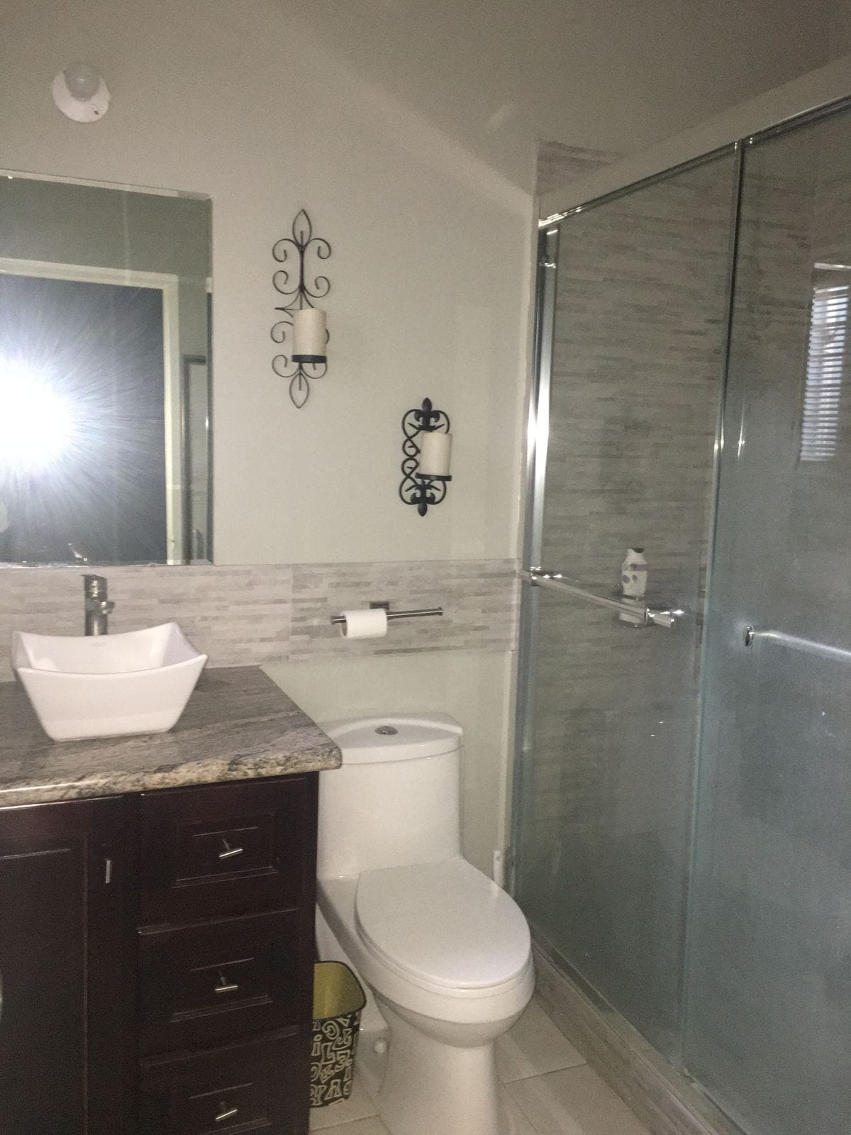 Shower, towels, soap, toilet paper