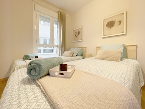 2 dormitorios, tabla de planchar con plancha, wifi gratis y ropa de cama