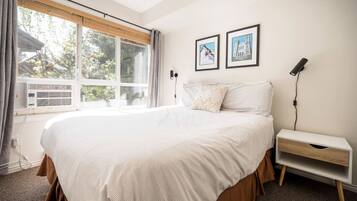 secondary bedroom with queen bed