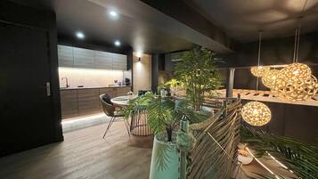 Luxury Suite | Private kitchen | Espresso maker, coffee/tea maker, mini-fridge, microwave