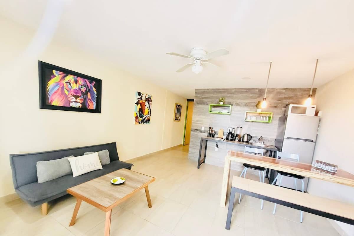 Basic Apartment | Living area | 40-inch Smart TV with satellite channels, TV, Netflix
