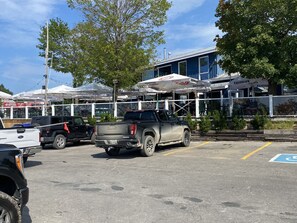 Property grounds - green land and has beautiful trees surrounding the land. (Penetanguishene)