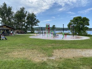 Children's area - green land and has beautiful trees surrounding the land. (Penetanguishene)