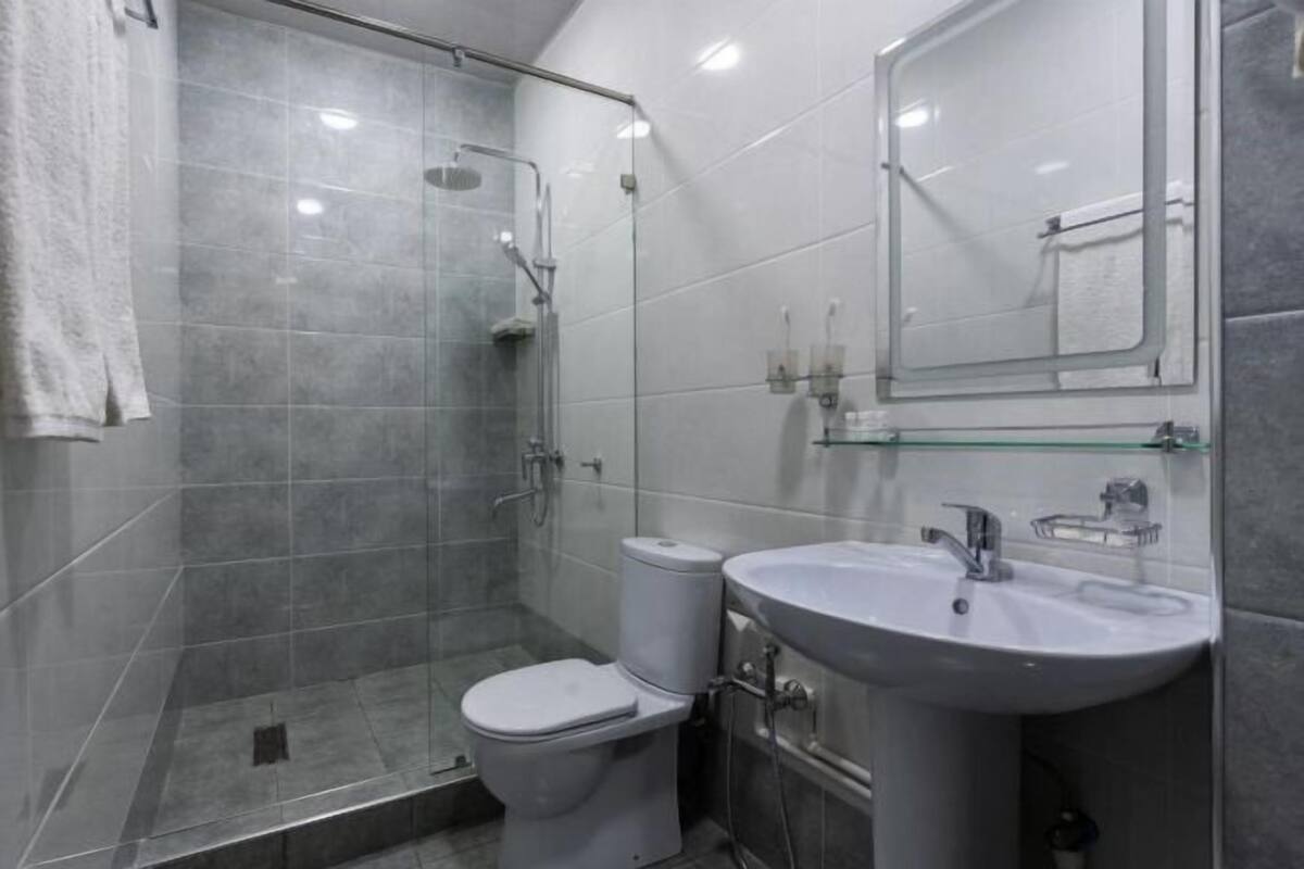 Shower, free toiletries, hair dryer, bathrobes