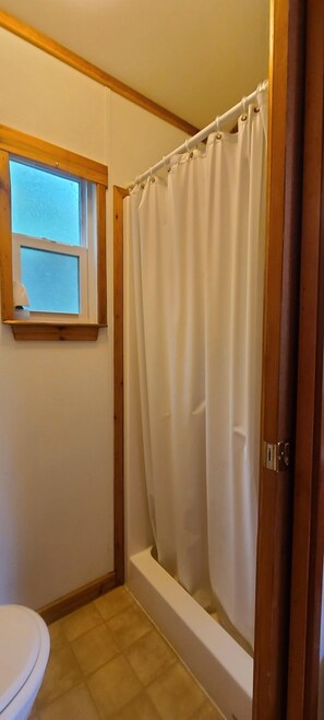 Shower, towels, soap, shampoo