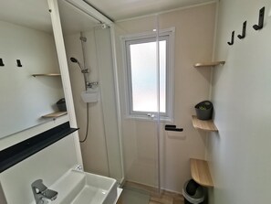 Regadera y secadora de cabello 