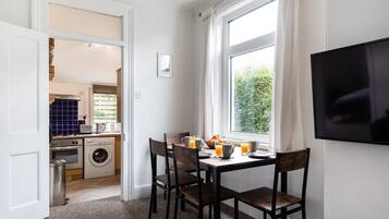 Apartment | Private kitchen | Fridge, microwave, cookware/dishes/utensils, dining tables