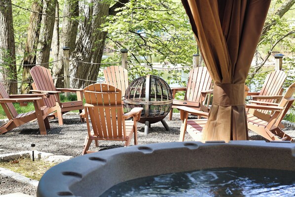 Outdoor spa tub - Serenity Creek: Waterfront Retreat w/ Hot Tub & Wood Burning Stove! (Lake Katrine)