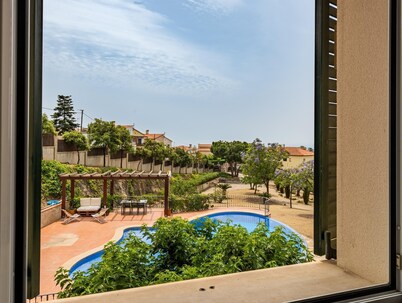 Architectural jewel between sea and mountains