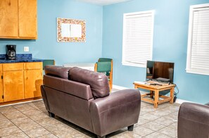 Family Studio Suite, 1 Bedroom | Living area | 36-inch Smart TV with cable channels, TV - Captain Quarters Motel (Port O Connor)