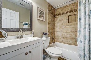 Shower, hair dryer, towels