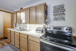 Private kitchen - Lakefront Phelps Cabin w/ Boat Dock & Water Toys! (Phelps)