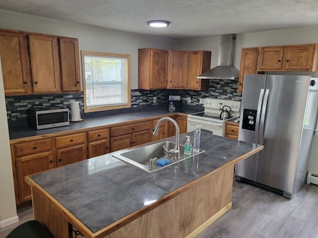 Fridge, microwave, oven, stovetop. Spacious 4 BR Home in Houghton Lake with Game Room across from the BEACH