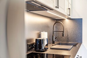 Oven, stovetop, dishwasher, coffee/tea maker