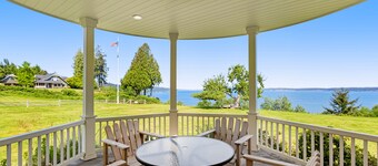 Inviting waterfront home with mountain views, firepit, W/D, & dog-friendly