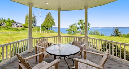 Inviting waterfront home with mountain views, firepit, W/D, & dog-friendly