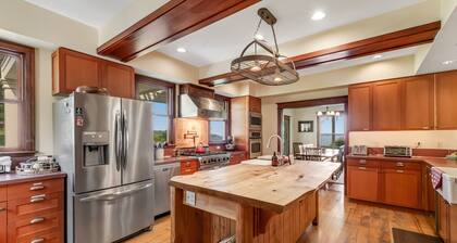 Inviting waterfront home with mountain views, firepit, W/D, & dog-friendly