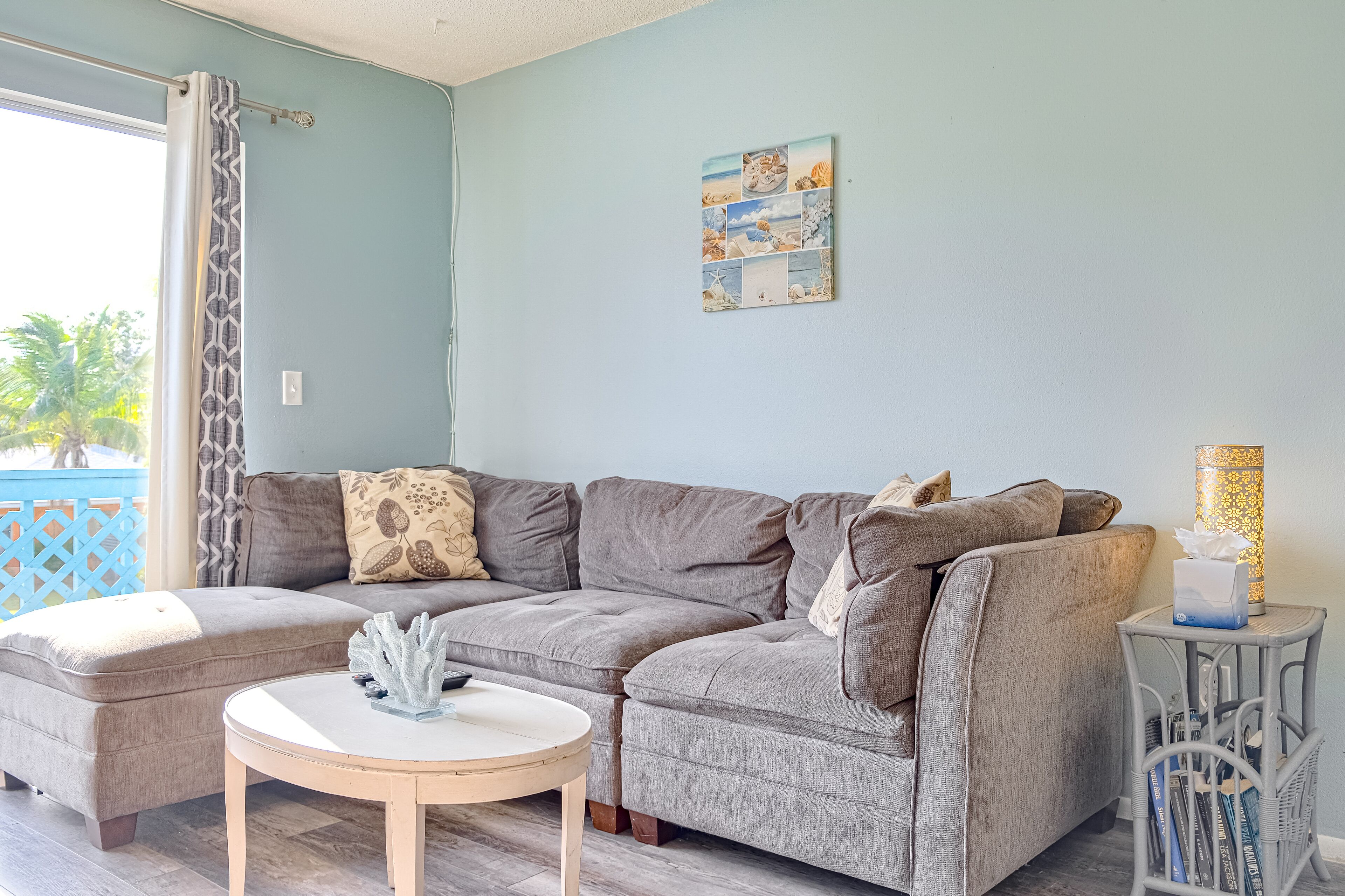 2nd-floor duplex near beach with heated pool, balcony, grill, W/D