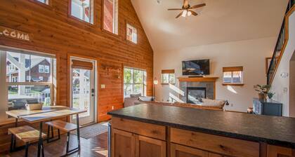 Sunlit, dog-friendly home with hot tub, gas fireplace, & washer/dryer
