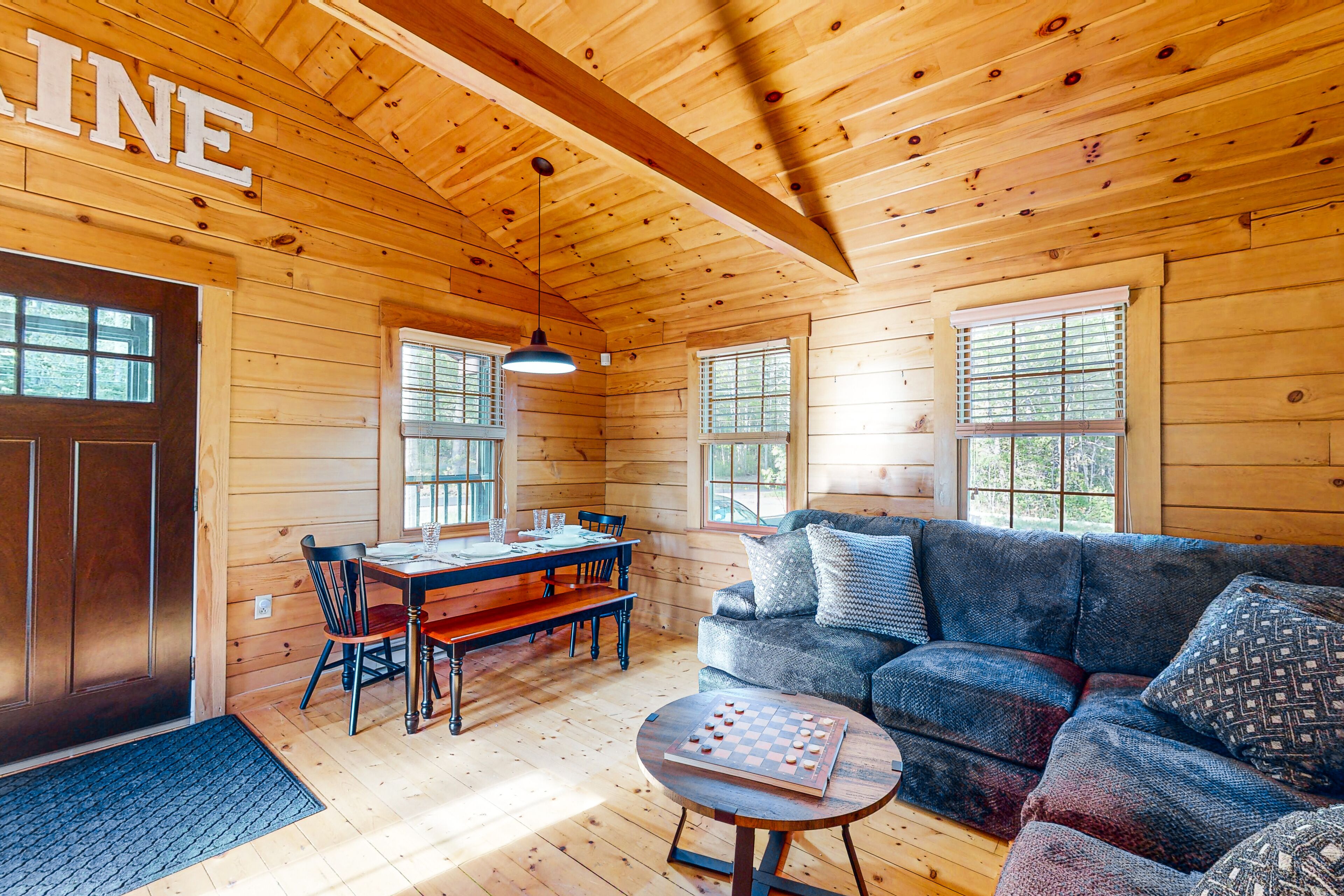 Modern log cabin with patio, grill, and washer/dryer