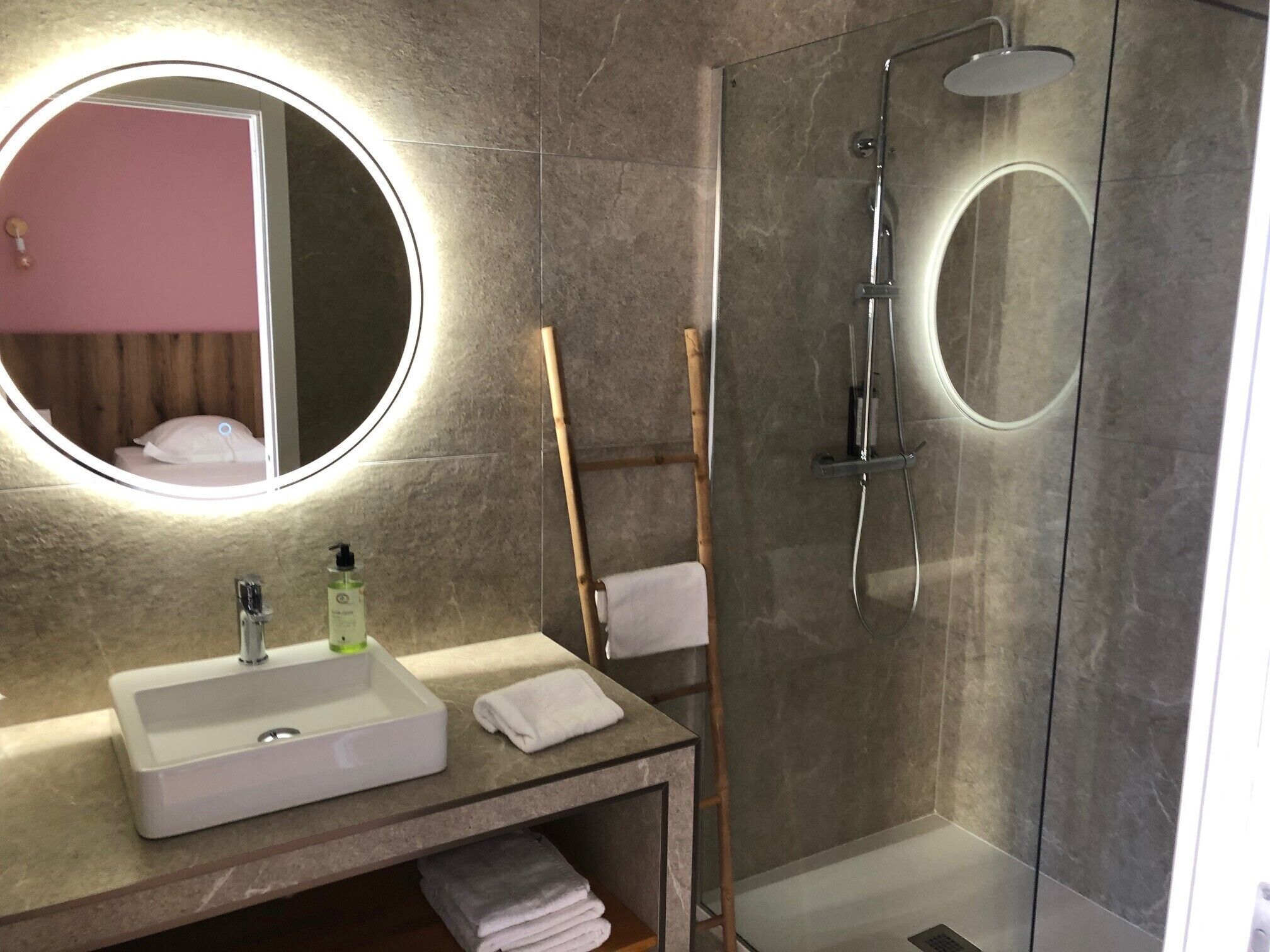 comfort room | bathroom | shower, hydromassage showerhead, hair dryer, towels