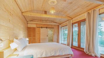 Habitación doble familiar, 1 habitación, para no fumadores, vista al jardín | 1 habitación, minibar y ropa de cama