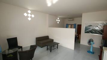 Economy Bungalow, Garden Area | Living area | TV