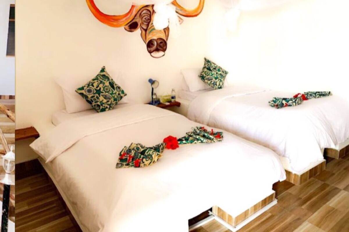 Chambre Design avec lits jumeaux | Matelas Select Comfort, coffres-forts dans les chambres