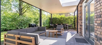 Chalet con veranda cerca del parque de vacaciones