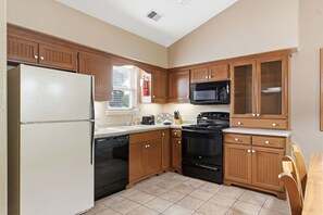 Fridge, microwave, oven, stovetop - King Bed Condo at StoneBridge Village Resort (Reeds Spring)