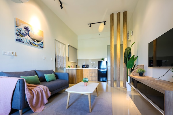Comfort Apartment | Living area | 55-inch Smart TV with digital channels, table tennis