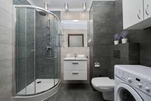 Regadera y shampoo 