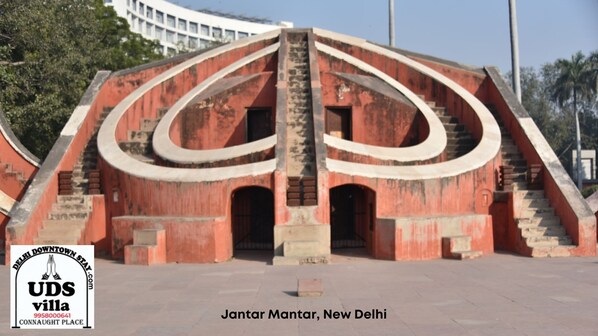 A building with a unique spiral staircase design, located in Jantar Mantar, New Delhi.