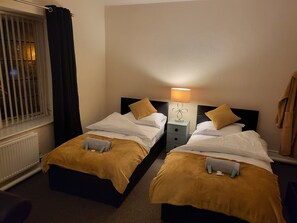 Classic Twin Room | Blackout curtains, iron/ironing board, free WiFi, bed sheets