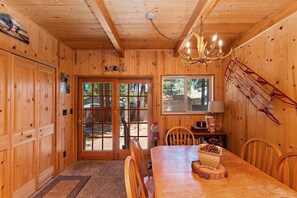 Enjoy meals at the dining table, relax by the window, and unwind in the cozy space.