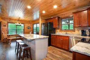 Fridge, microwave, oven, stovetop - Rustic Pigeon Forge Cabin w/ Hot Tub, Theater & Fire Pit (Sevierville)