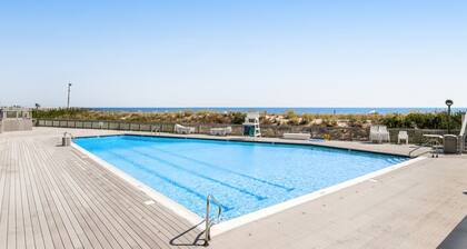 Sea Colony oceanfront condo with private balcony, shared pools, & gym