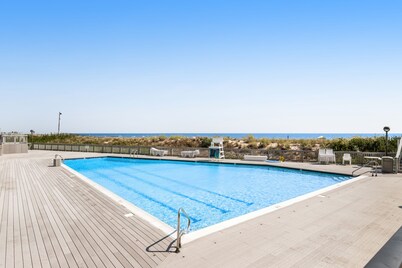 Sea Colony oceanfront condo with private balcony, shared pools, & gym