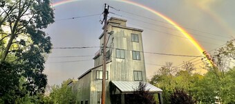 Modern penthouse suite in a restored grain tower with private roof deck. 