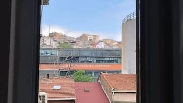 Superior Triple Room | Living area | TV