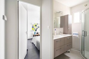 Shower, hair dryer, soap, shampoo